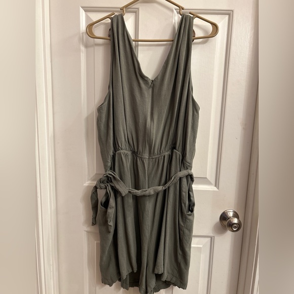 Adorne Woman Nia v-neck pleated olive green romper shorts with pockets. - Picture 2 of 3